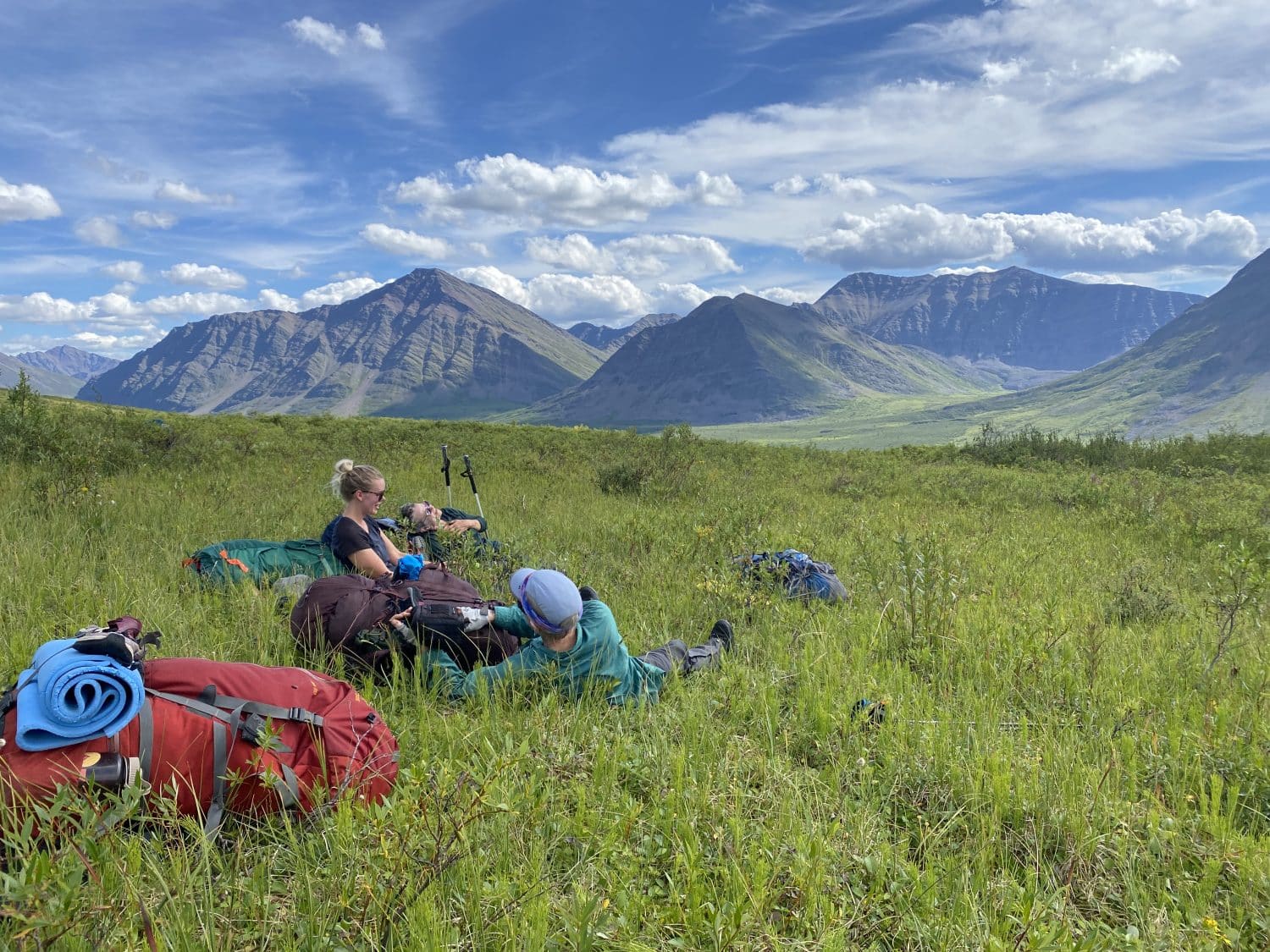 Backpackers taking a break in the Ogilvie Mountains